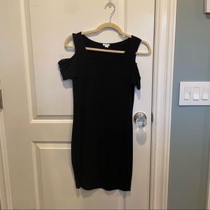Black dress with cut out shoulders.